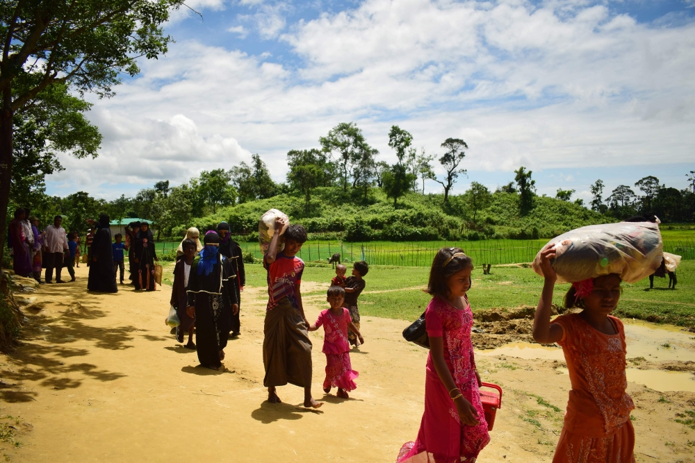 Violence erupts in Myanmar, Rohingya Muslims flee to Bangladesh amid gunfire Violence erupts in Myanmar, Rohingya Muslims flee to Bangladesh amid gunfire