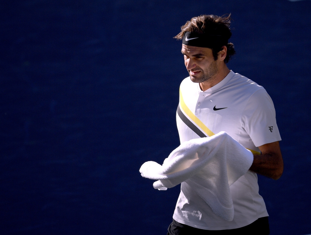 Federer advances to quarter-finals; Halep reaches semifinals