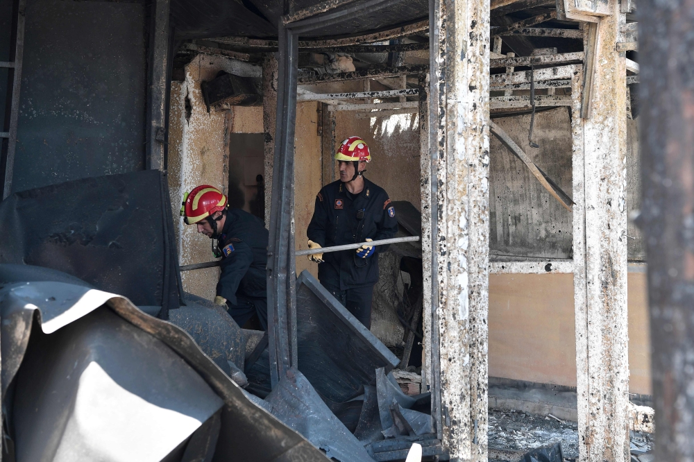 'Left at God's mercy': Greeks seek answers as fire toll rises