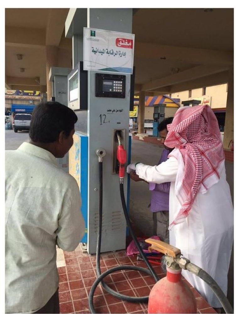 Ministry of Commerce and Investment officials shutting down a gas station for fraud. — Courtesy photos