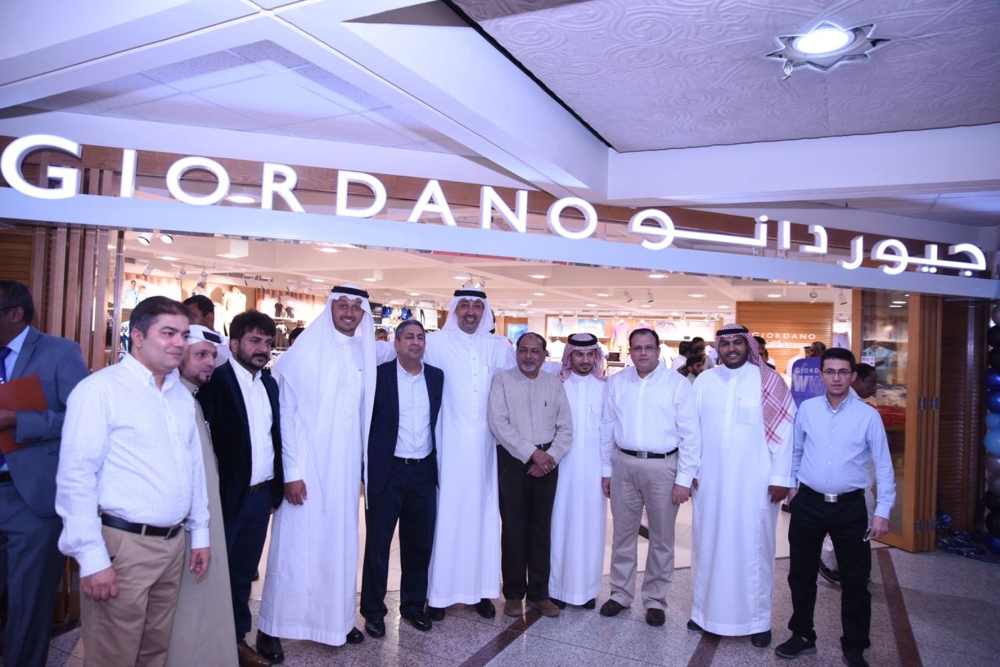 Mazen Baterjee, vice chairman of the Jeddah Chamber of Commerce and Industry, and Ishwar Chugani, managing director of Giordano, cut the ceremonial ribbon, assisted, among others, by Sheikh Hani Abdul Aziz Saab, chairman of the Board, Textile and Garments Co., and Khalid Almaeena, Managing Partner of Quartz Communications


