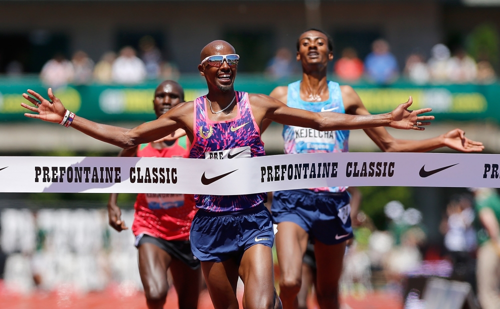 Mo Farah of Great Britain crosses the finish line to win the 5000m during the 2017 Prefontaine Classic Diamond League at Hayward Field in Eugene, Oregon, Saturday. — AFP