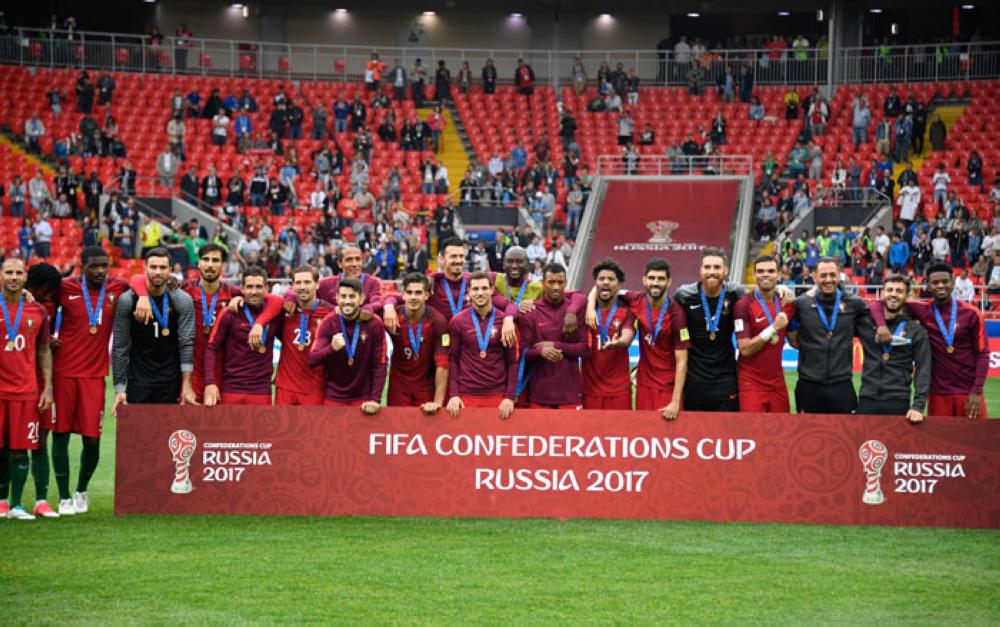Portugal's players pose with their bronze medals after the 2017 FIFA Confederations Cup third place football match against Mexico at the Spartak Stadium in Moscow Sunday. — AFP