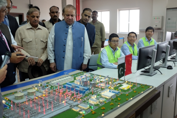 Pakistani Prime Minister Nawaz Sharif listens as experts explain a process of the Haveli Bahadur Shah LNG power plant during the inauguration in Jhang, Pakistan, in this July 7, 2017 file photo. — Reuters