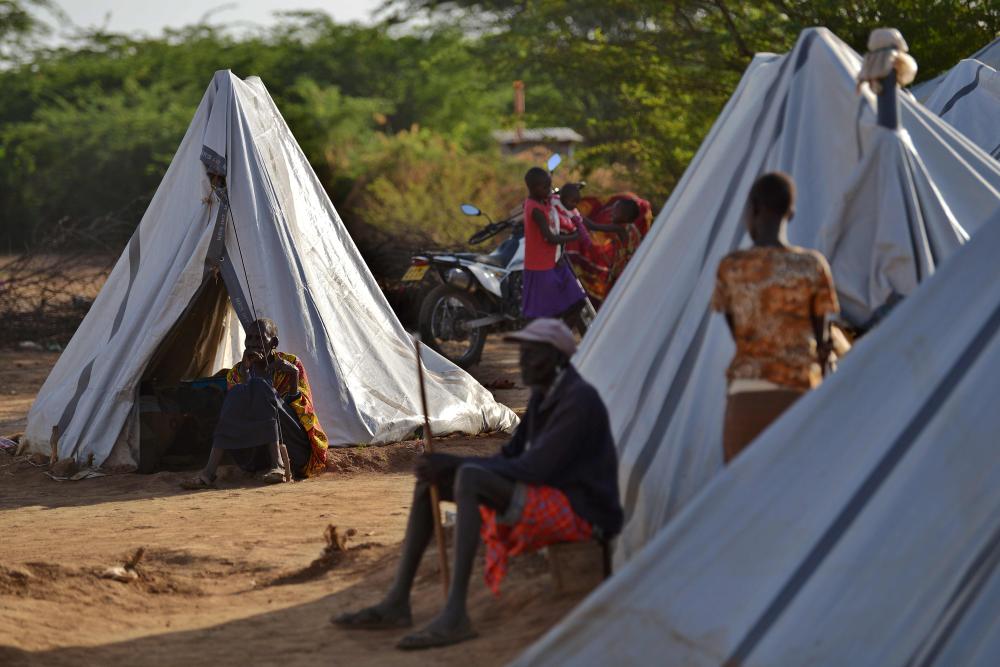 An elderly woman from the Ilchamus community sits outside her shelter at a camp for the internally displaced at Eldume, near the administrative town of Marigat, Baringo county where more than 700 Ilchamus took shelter after fleeing deadly attacks by bandits alleged to be from the Pokot community at their former settlement of Mukutani in March. — AFP