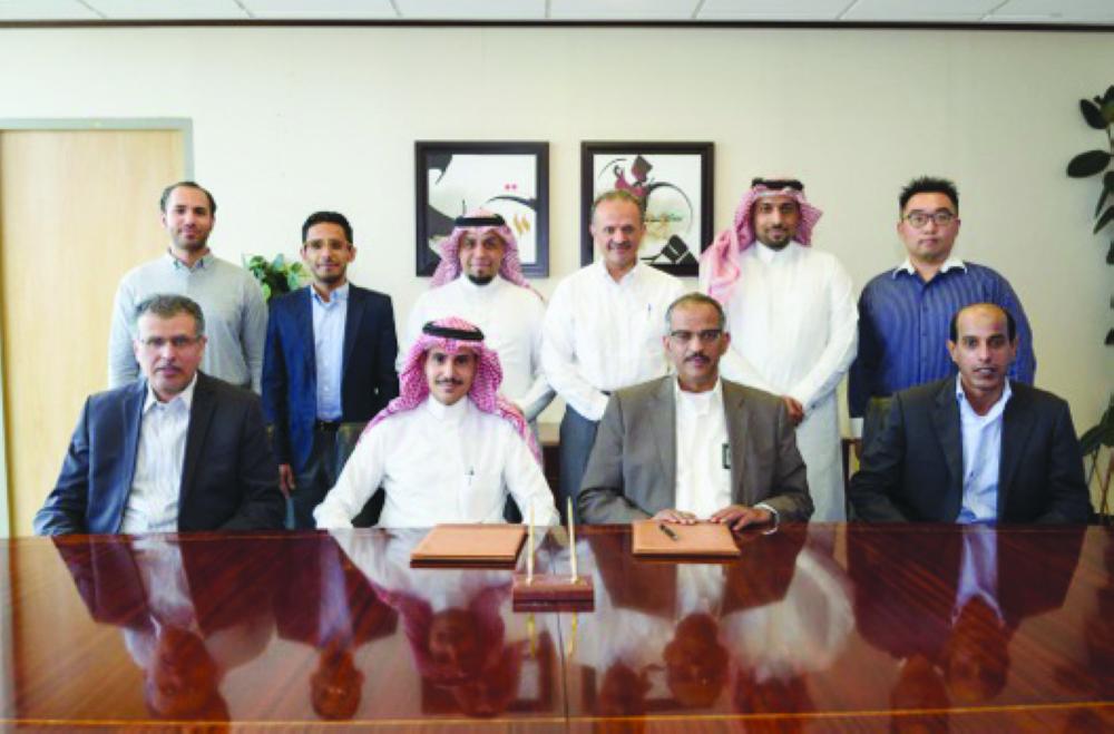 Senior executives of Saudi Aramco and SAP during the signing of partnership deal 