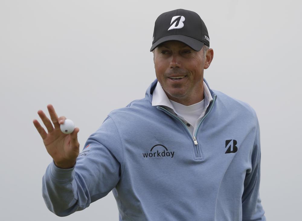 Matt Kuchar of the US reacts after a birdie on the 15th hole during the second round of the British Open Golf Championship at Royal Birkdale in Southport, England, Friday. — AP