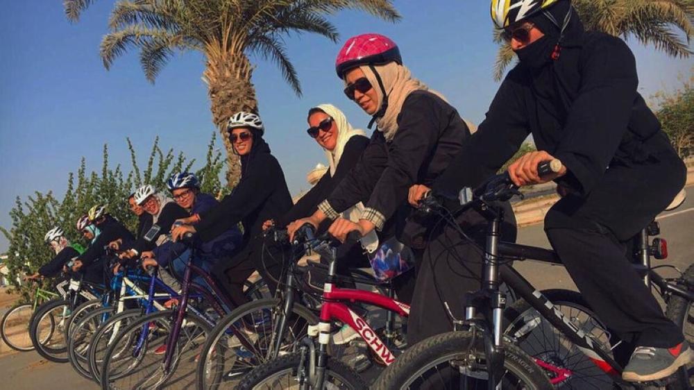 Women cyclists ride around the Corniche wearing long pants and loose shirts with helmets carefully placed over their headscarves. — Courtesy: Al-Arabiya