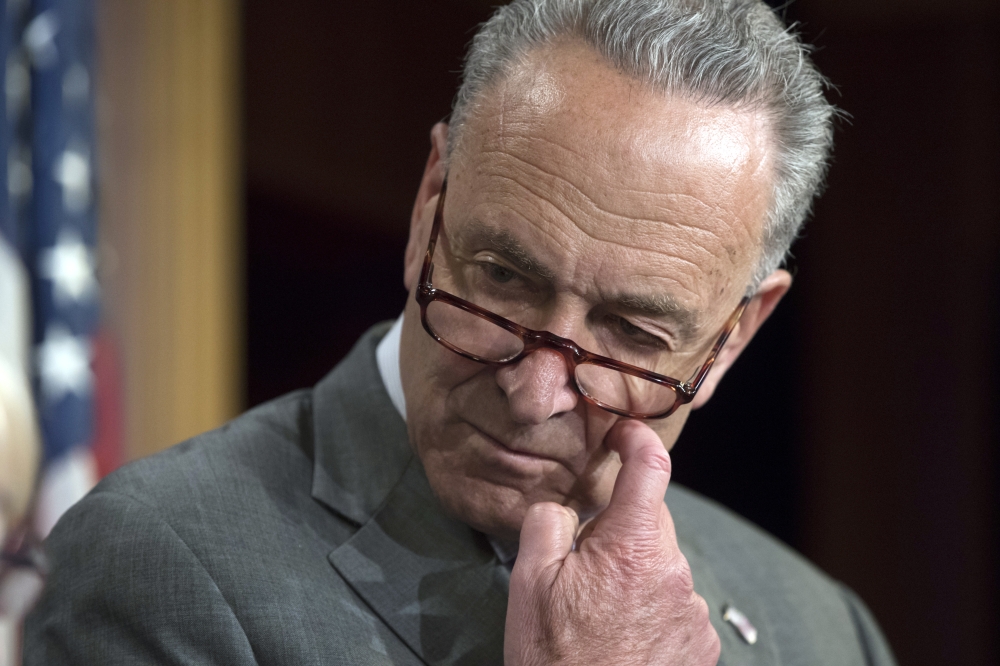 Senate Minority Leader Chuck Schumer of New York pauses during a news conference on Capitol Hill in Washington in this July 13, 2017 file photo. — AP