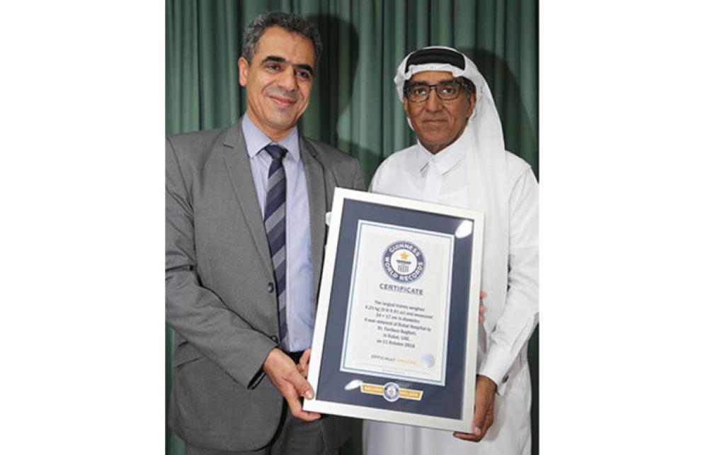 Dr. Fariborz Bagheri and Ahmed Saeed Mohammed Omar with the Guinness World Records certificate. — Courtesy photo