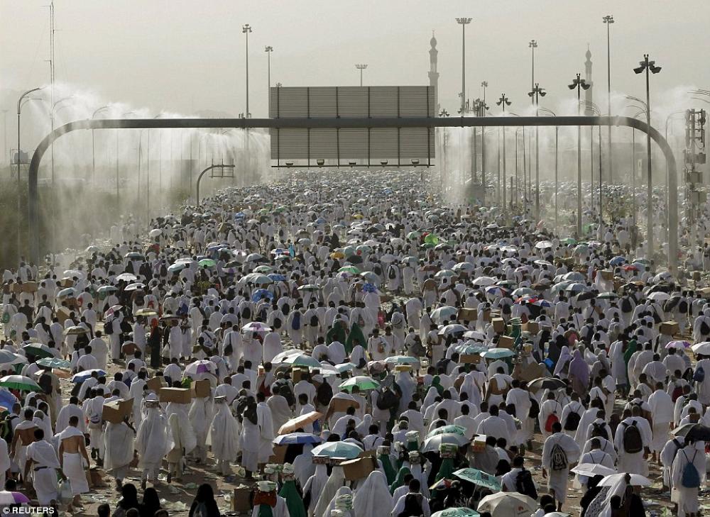 The Ministry of Health has set up 208-water-spray cooling fans, seen in this file picture, as part of its efforts to treat pilgrims hit by sweltering sun during this Haj season and safeguard their health. — Reuters