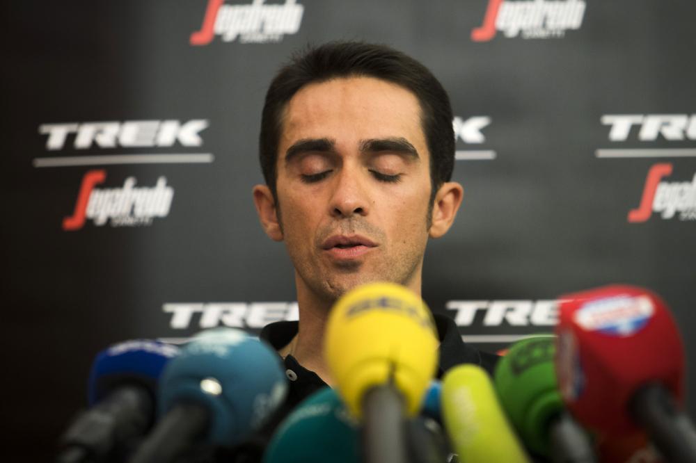 Trek-Segafredo team's Spanish cyclist Alberto Contador has his eyes closed as he speaks during a press conference on Friday in Nimes, southern France, ahead of the 72nd edition of 