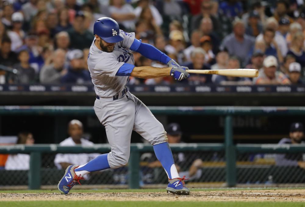 Los Angeles Dodgers’ Chris Taylor doubles against the Detroit Tigers in the sixth inning of their MLB game in Detroit Friday. — AP 