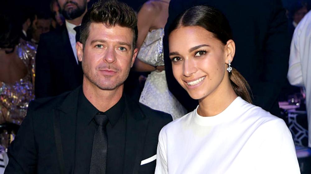 Robin Thicke and April Love Geary