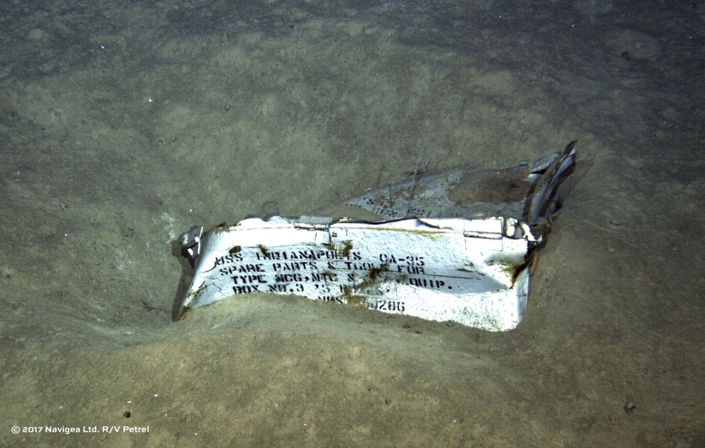 This undated image from a remotely operated underwater vehicle courtesy of Paul G. Allen, shows a spare parts box from the USS Indianapolis on the floor of the North Pacific Ocean. — AP