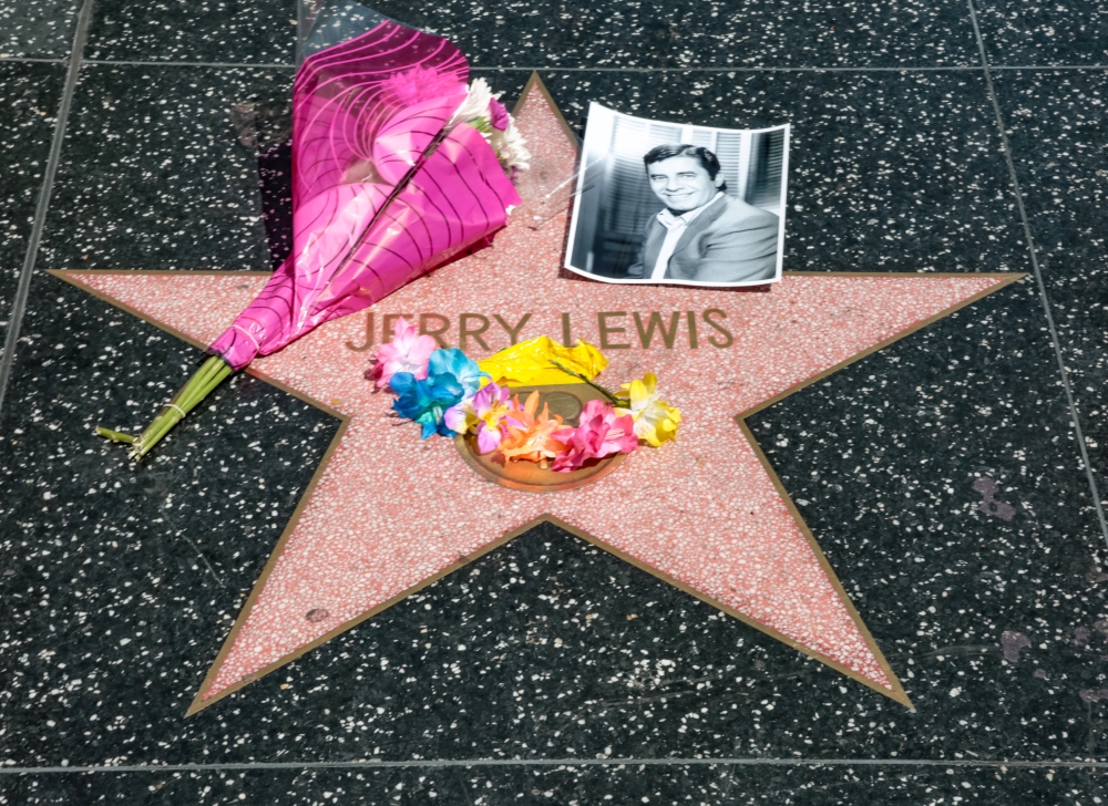 A makeshift memorial appears for late comedian, actor and legendary entertainer Jerry Lewis around his star on the Hollywood Walk of Fame in Los Angeles, California on Sunday. - Reuters