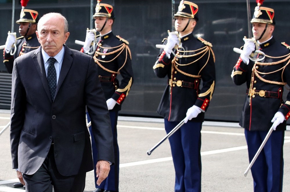 French Interior Minister Gerard Collomb reviews troops before a meeting at the Direction Generale de la Gendarmerie nationale (DGGN) in Issy-Les-Moulineaux, near Paris, France, on Wednesday. — Reuters
