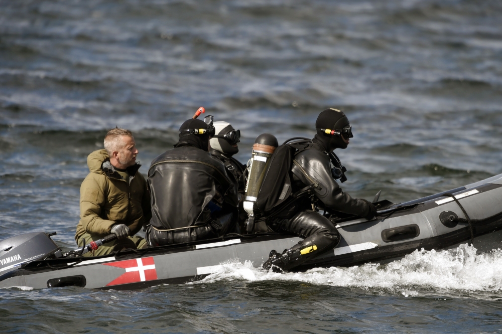 Divers from the Danish Defense Command preparing for a dive in Koge Bugt near Amager in Copenhagen on Tuesday. — Reuters