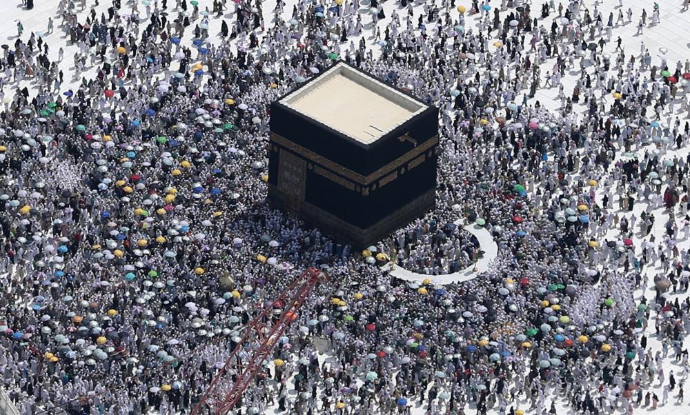 Pilgrims circumambulate the Kaaba, Islam's holiest shrine, at the Grand Mosque in Makkah, Saturday. — AFP