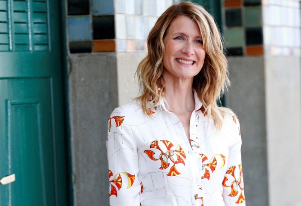 Actress Laura Dern poses in front of her dedicated beach locker room on the Promenade des Planches on Saturday in the northwestern sea resort of Deauville, during the 43rd Deauville American Film Festival. - AFP