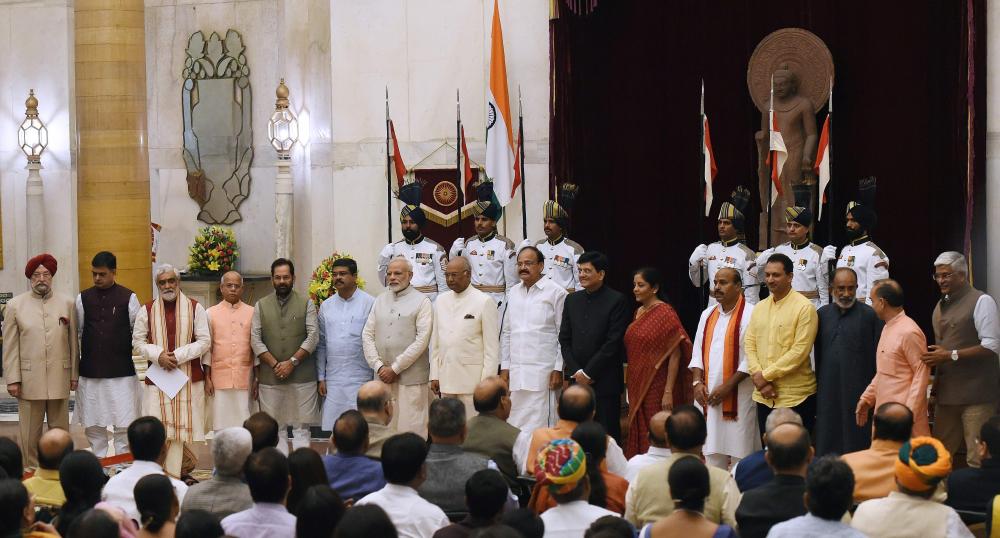 Nirmala Sitharaman takes the oath during the swearing-in ceremony of new ministers at the Presidential Palace in New Delhi. — AFP