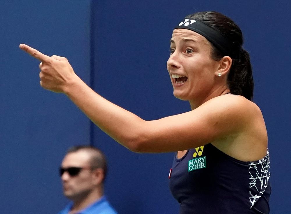 Anastasija Sevastova of Latvia reacts during her match against Maria Sharapova of Russia at the US Open in New York Sunday. — Reuters