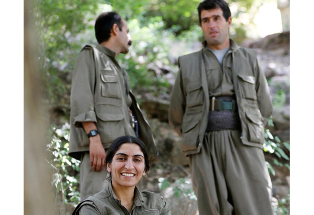 Members of the anti-Iranian group, Kurdistan Free Life Party (PJAK), resting at their base deep on the Iraq-Iran border of northern Iraq’s Kurdish autonomous region. — AFP
