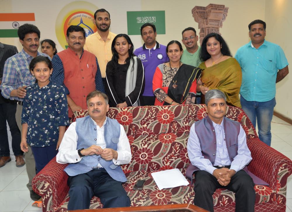 Indian Ambassador Ahmad Javed and Anil Nautiyal, counselor, Community Welfare, with some of the familes  at the meeting.