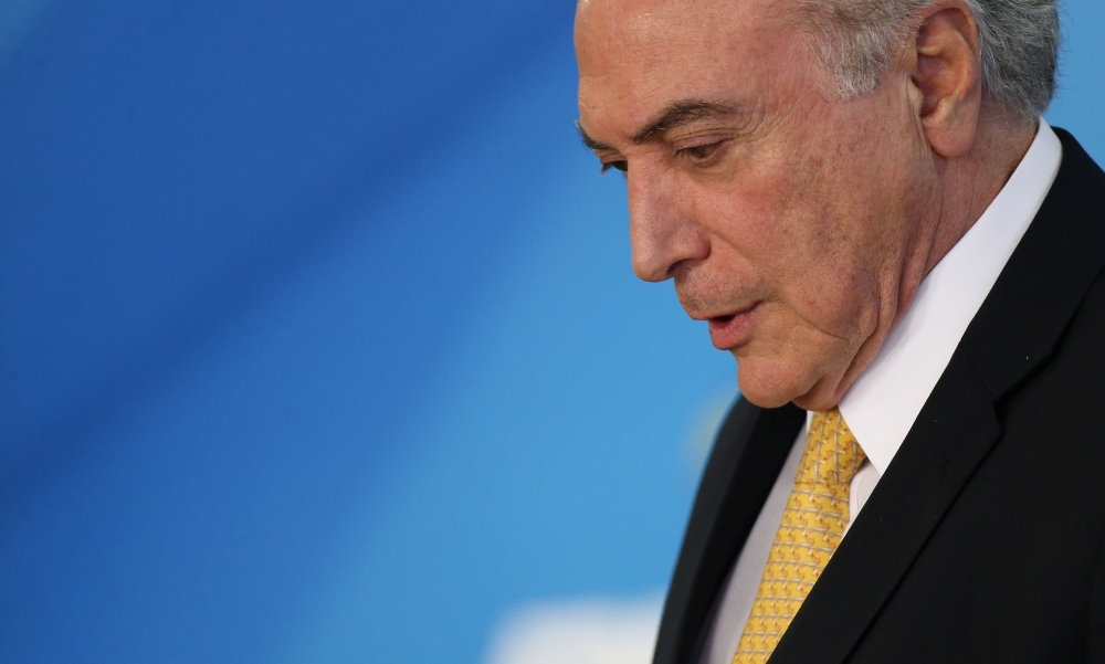 Brazil’s President Michel Temer attends a meeting with trade unionists at the Planalto Palace in Brasilia on Tuesday. — Reuters