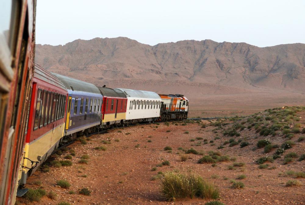 The Oriental Desert Express train en route from Oujda to Bouarfa in northeastern Morocco. The track in the remote east near the border with Algeria was originally built nearly 100 years ago when Morocco was a French protectorate. The 350-km journey through the desert can take between eight to twelve hours, and sometimes even more, depending on the sandstorms. — AFP 
