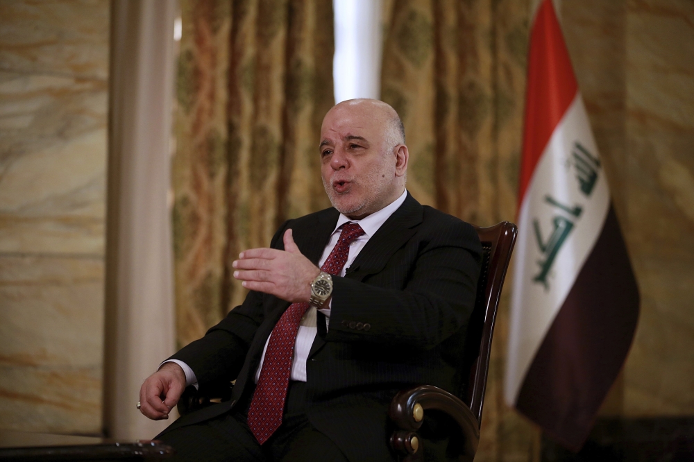 Iraq's Prime Minister Haider Al-Abadi speaks during an interview with The Associated Press in Baghdad, Iraq, Saturday. — AP