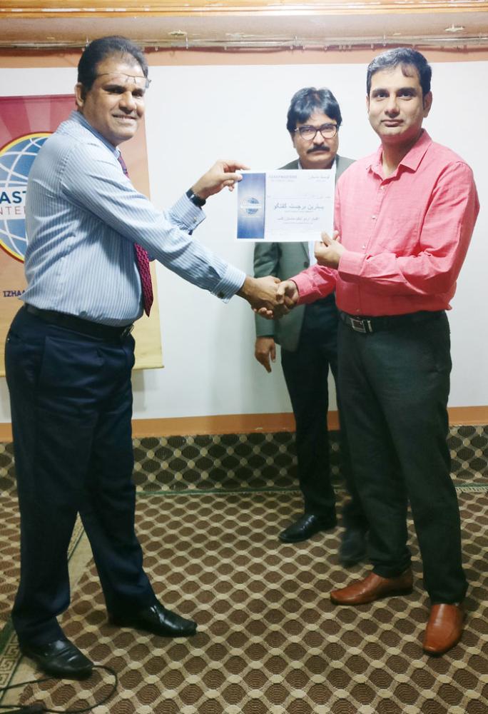 Winners of the evening with the executive team of Izhaar Urdu Talk Masters.
