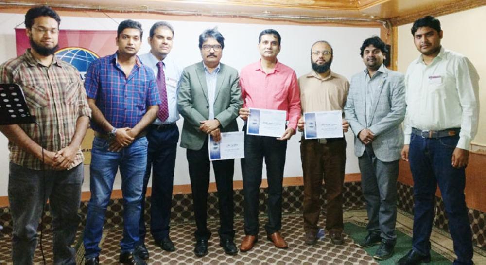 Winners of the evening with the executive team of Izhaar Urdu Talk Masters.
