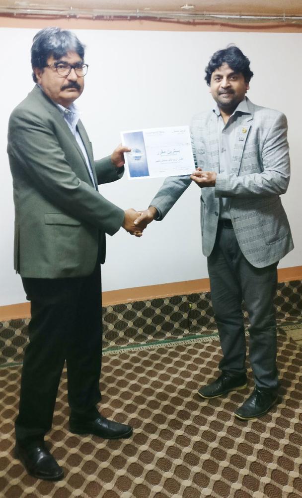 Winners of the evening with the executive team of Izhaar Urdu Talk Masters.
