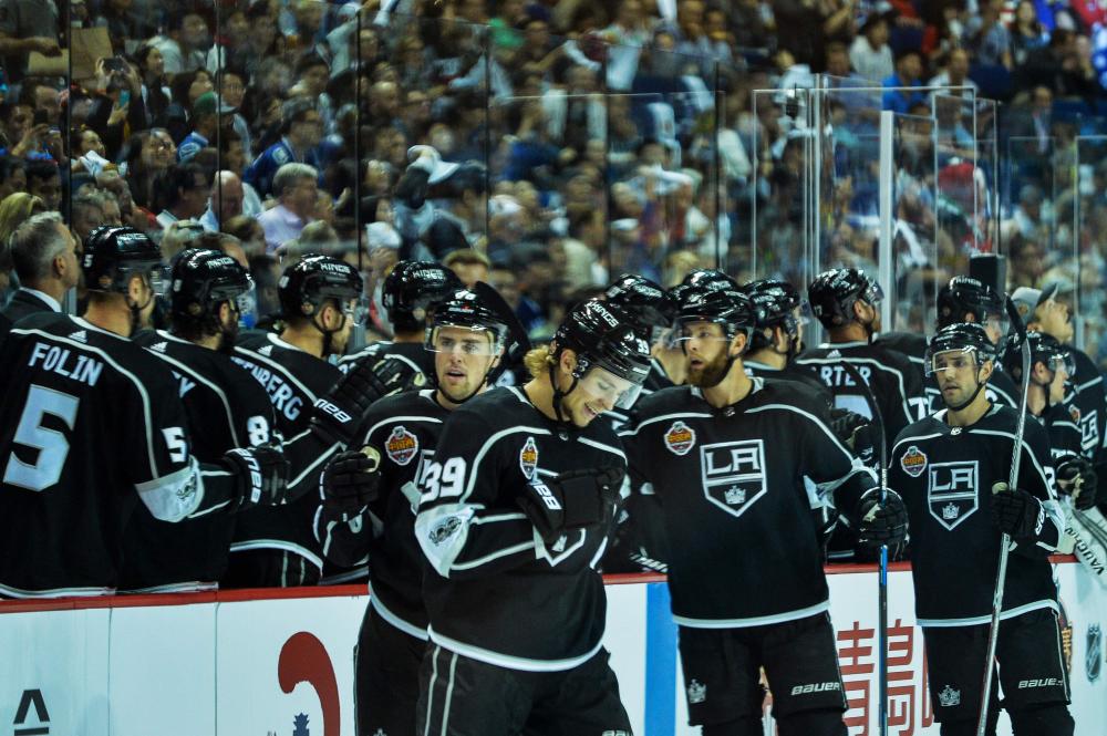 Players of Los Angeles Kings celebrate their goal against Vancouver Canucks during the 2017 NHL China Games in Shanghai Thursday. — AFP