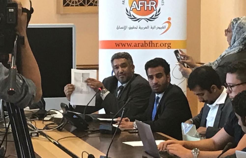 Dr. Ahmed Al-Hamli, chairman of the Arab Federation for Human Rights shows the complaint.