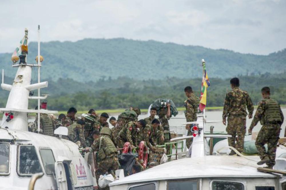 Myanmar soldiers arrive at Buthidaung jetty in Myanmar’s Rakhine State in this Aug. 29, 2017 file photo. — AFP