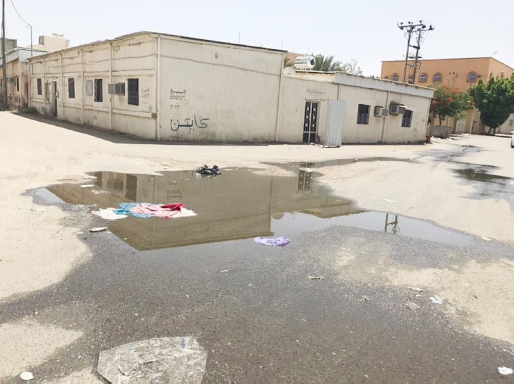 Leaking sewage forms a pool in the Midhbae district of Hawiya. — Okaz photo