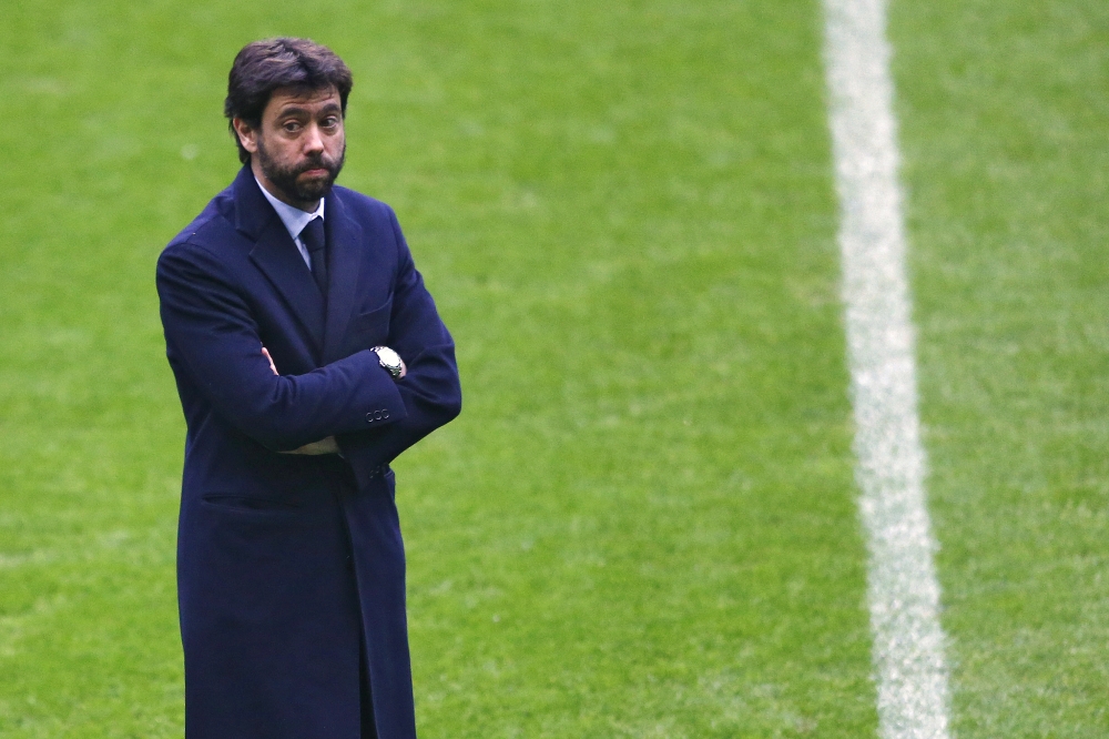 In this file photo Andrea Agnelli, president of Juventus, arrives at the Allianz Arena stadium prior to the Champions League soccer match between Bayern Munich and Juventus Turin in Munich, Germany. Agnelli has been banned for a year by the Italian football federation for an allegedly illicit relationship with hard-core 