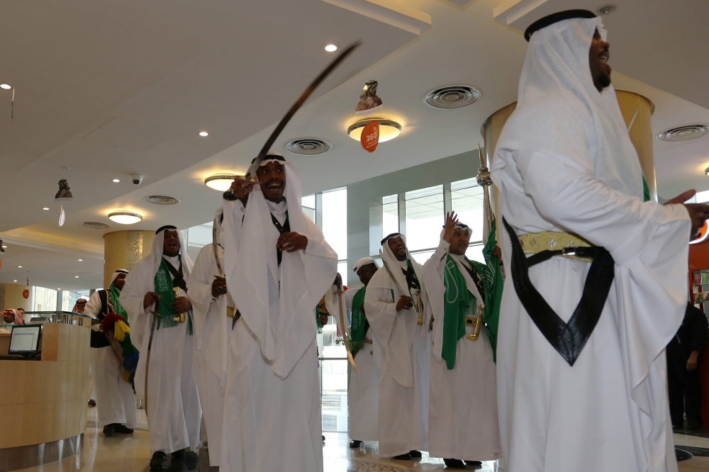 Tawuniya welcomes the employees  with Ardah during Saudi National day 87