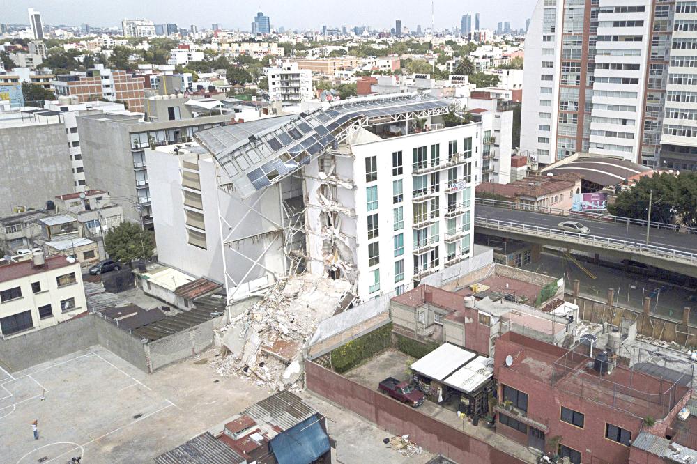 This Sept. 24, 2017 photo shows an apartment building that was partially destroyed during the 7.1 magnitude earthquake on Emiliano Zapata Avenue in Mexico City. — AP