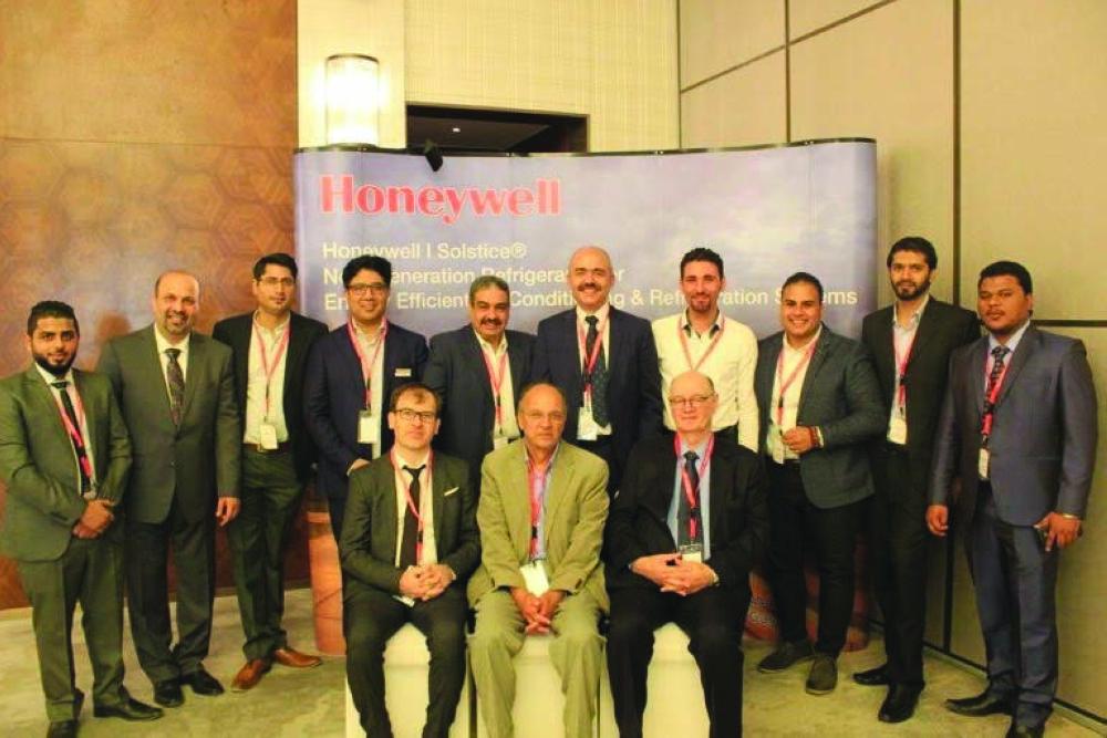 Executives of Honeywell and CGS pose for a group photo