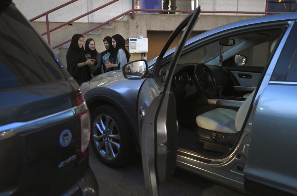 Saudi women take part in a training program for new female drivers at Careem, a chauffeur driven car booking service, at their Saudi offices in Al-Khobar. — AFP