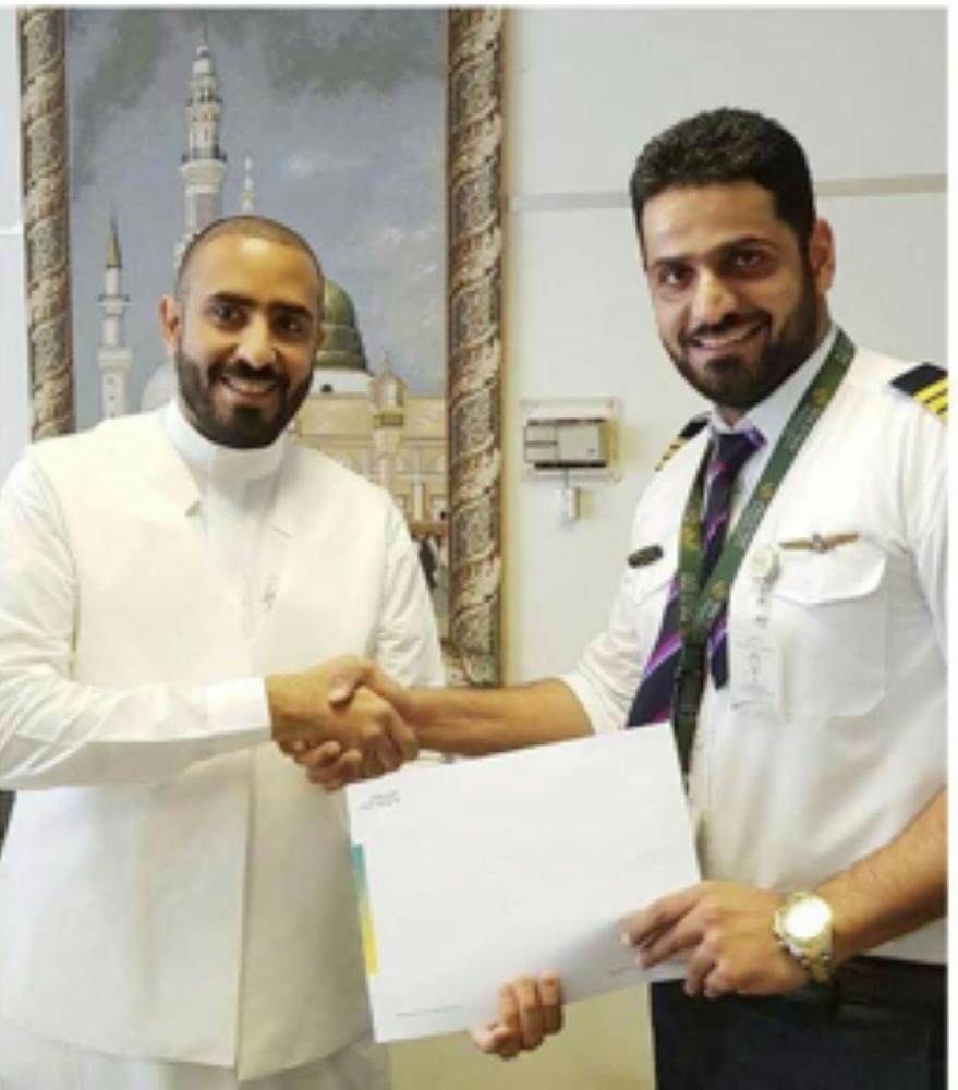 Patron in Chief of Madinah Cricket League, Ahmed Bakur Zaidan, handing over the cricket grounds contract to MCL President Hammad Saeed.