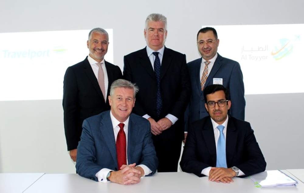  Executives of Al Tayyar Travel Group and Travelport in a group photo after the signing of agreement
