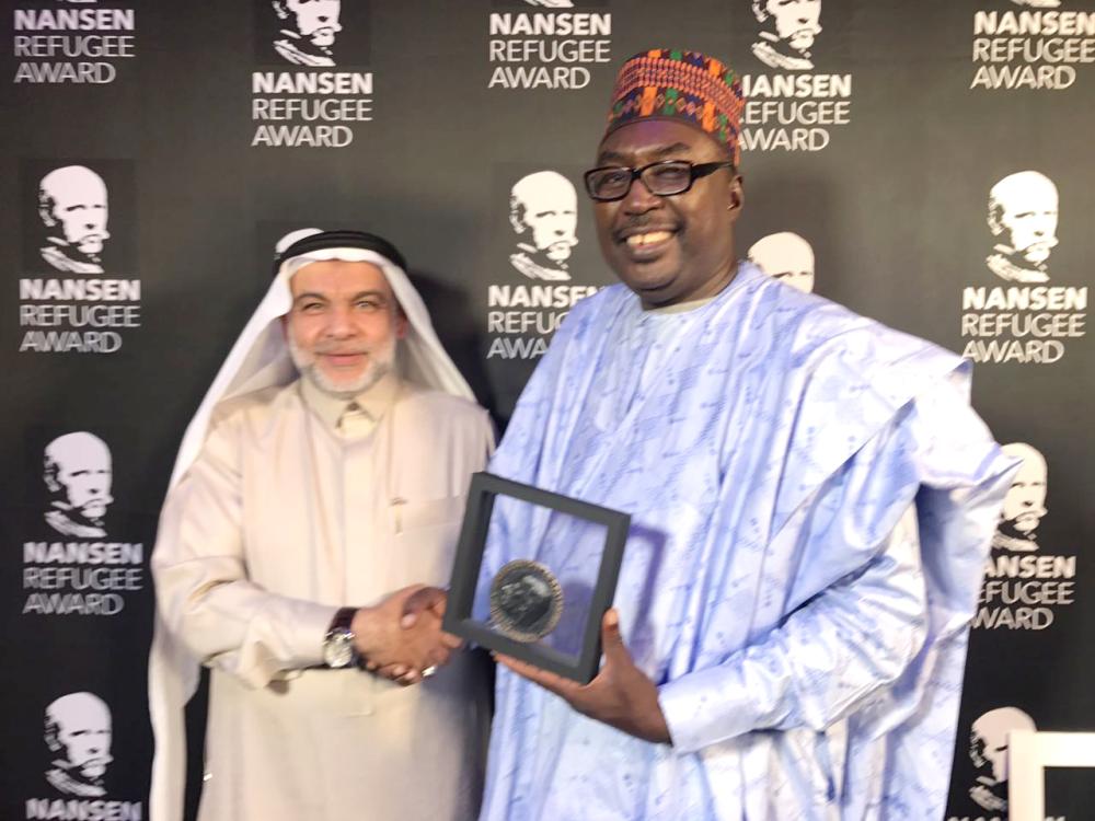 Mr. Hassan Darweesh Hamed Shahbar, secretary-general of International  Islamic Relief Organization, Saudi Arabia (IIROSA), left, with Barrister Zanna B. Mustapha, director  of the Future Prowess Islamic Foundation, Maiduguri, Borno State, during award ceremony in Geneva, Switzerland, in this file photo. — Courtesy photo