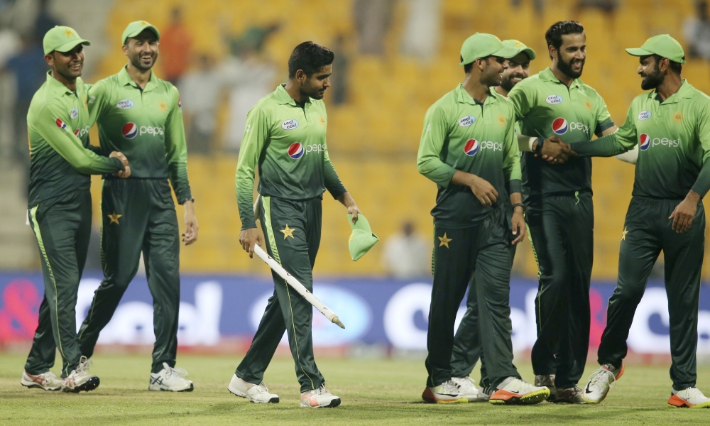 Pakistan players celebrate after they beat Sri Lanka in their second ODI cricket match in Abu Dhabi, United Arab Emirates, Monday, Oct. 16, 2017. (AP Photo/Kamran Jebreili)