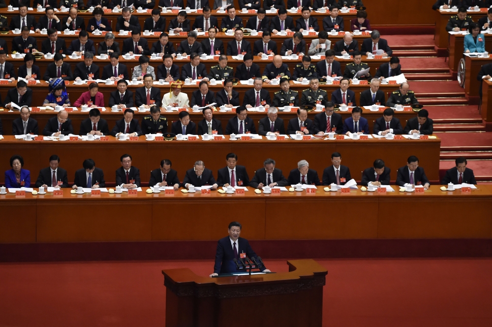 China’s President Xi Jinping gives a speech at the opening session of the Chinese Communist Party's five-yearly Congress at the Great Hall of the People in Beijing on Wednesday. — AFP