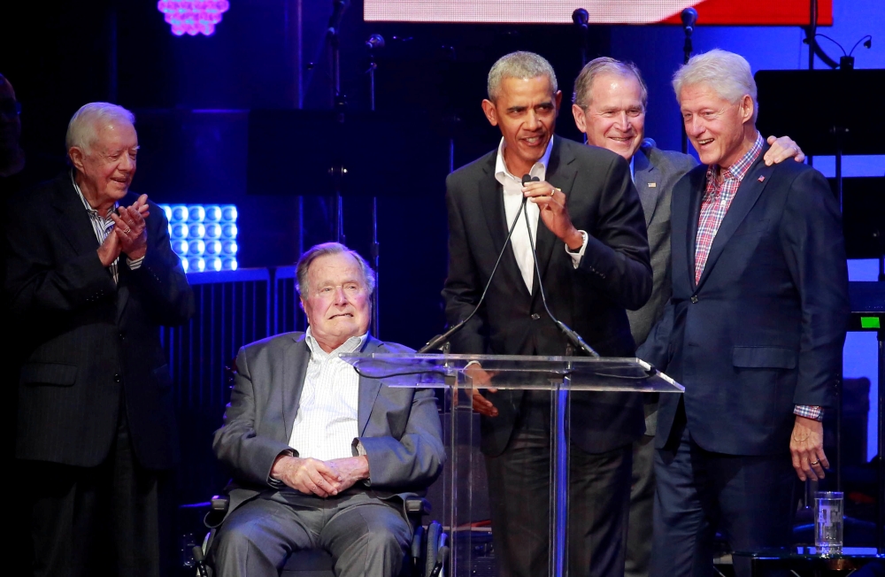 Five former US presidents, Jimmy Carter, George H.W. Bush, Barack Obama, George W. Bush and Bill Clinton, speak during a concert at Texas A&M University benefiting hurricane relief efforts in College Station, Texas, on Saturday. — Reuters