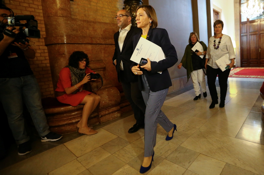 Speaker of the Catalan regional Parliament Carme Forcadell arrives to preside over the parties' spokespersons board meeting at the Parliament in Barcelona, Spain, on Monday. — Reuters